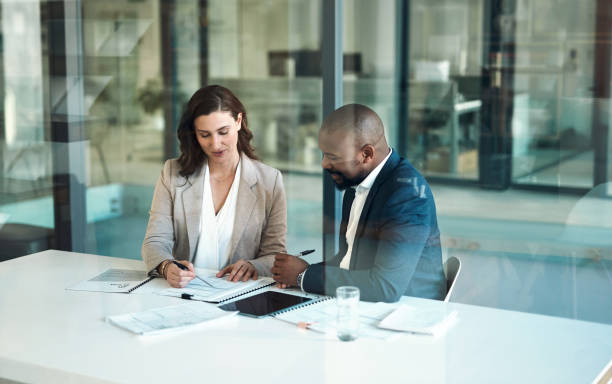 Attorney with bilingual client at the table