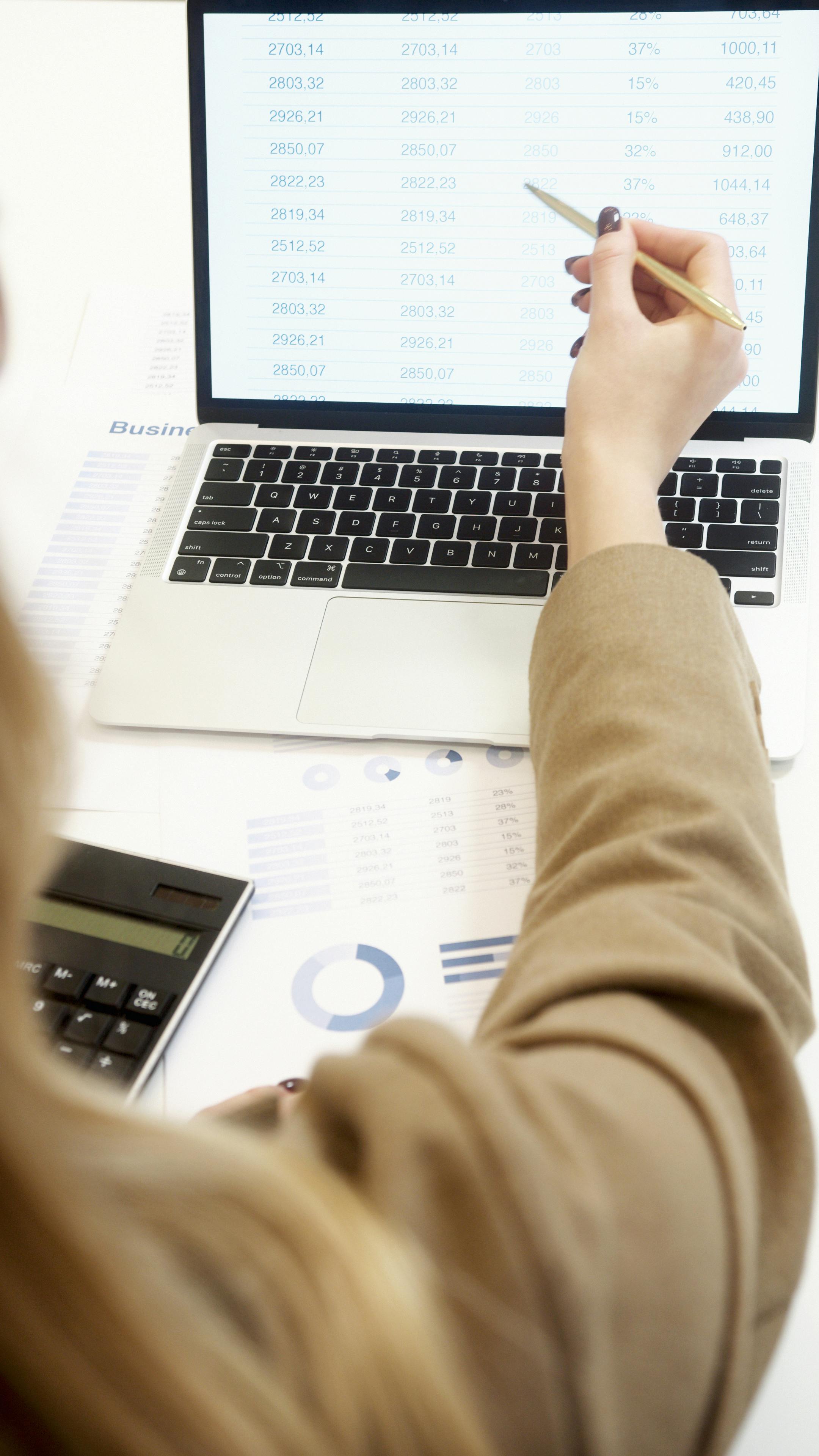 Back office operator at workstation processing administrative records